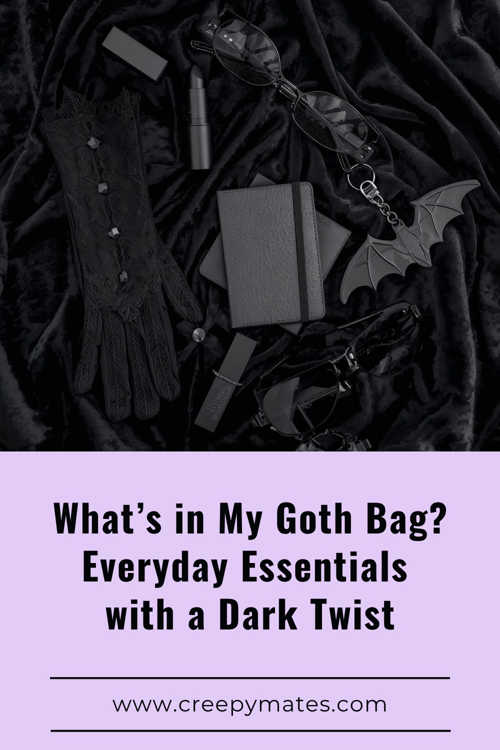 Goth flat lay with black lace glove, sunglasses, notebook, lipstick, and a bat keychain on black velvet.