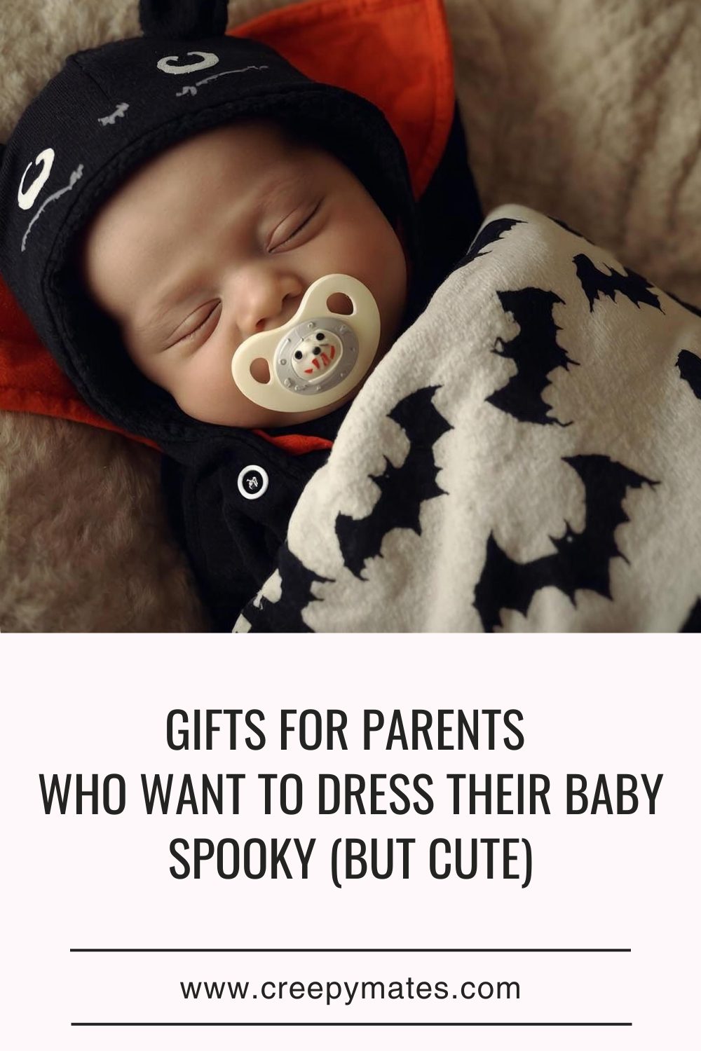 A sleeping baby dressed in a black Halloween outfit with a bat-patterned blanket and a pacifier.