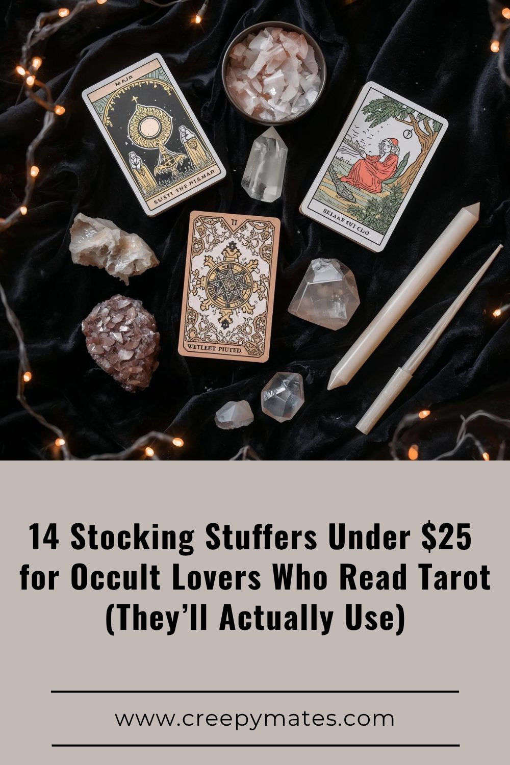 Three tarot cards surrounded by crystals, salt, candles, and fairy lights on a black velvet cloth.