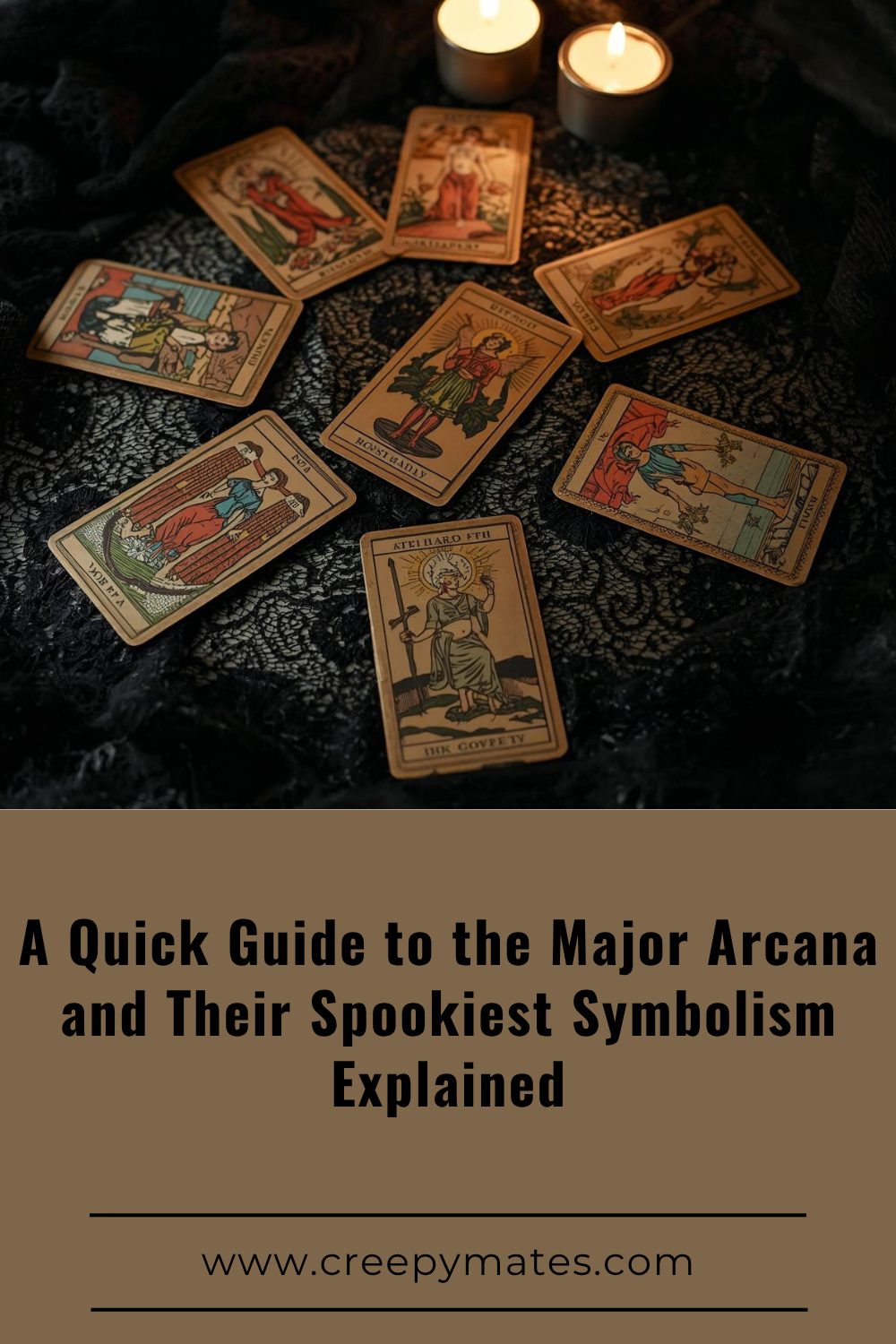 flat lay of vintage tarot cards on black lace with moody lighting and candles.